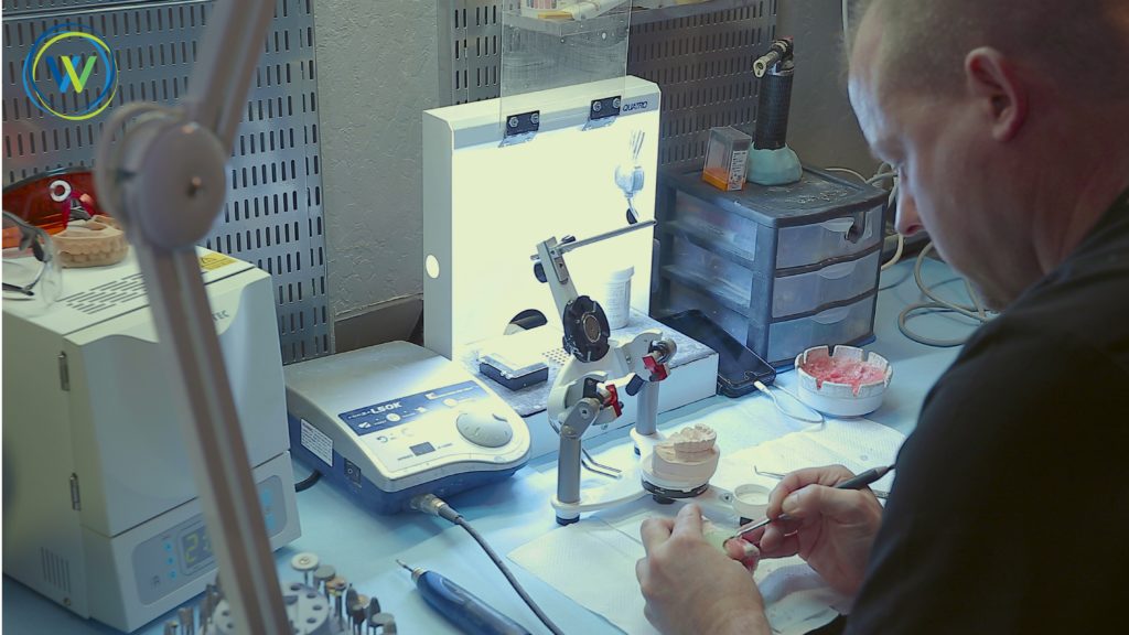Person creating a brace in a lab