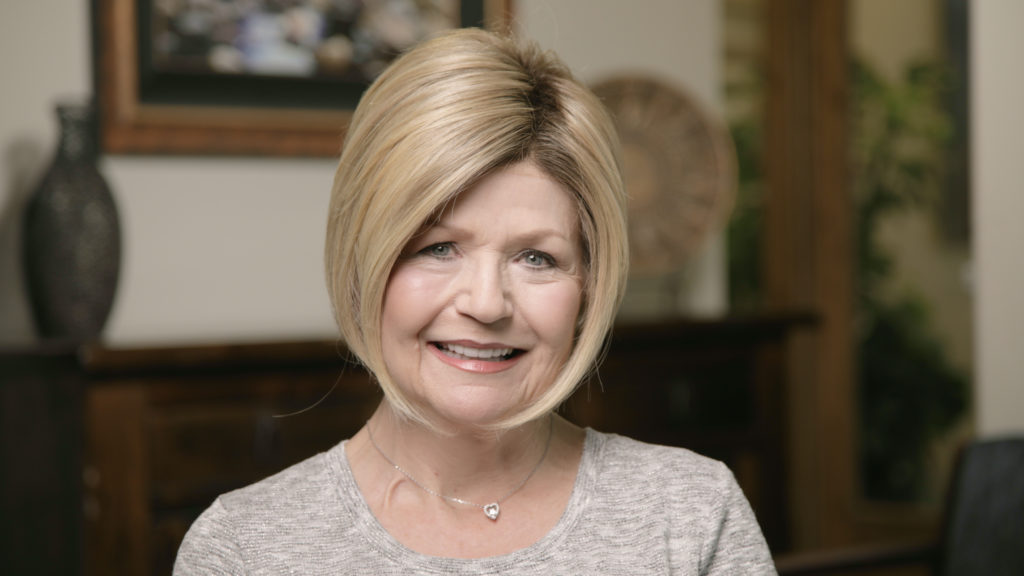 Smilling patient Diane giving a testimonial