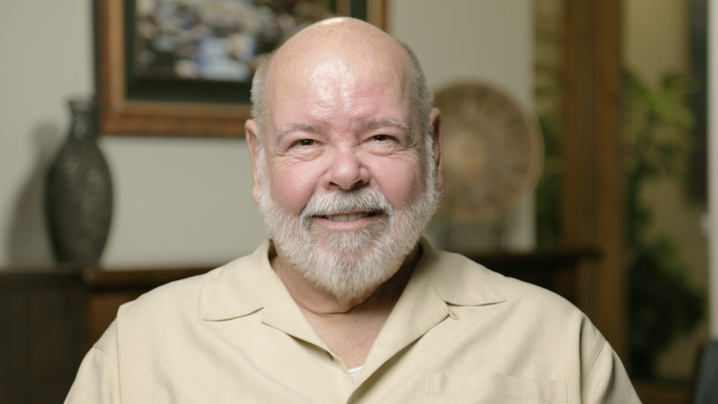 Smilling patient Dennis giving a testimonial
