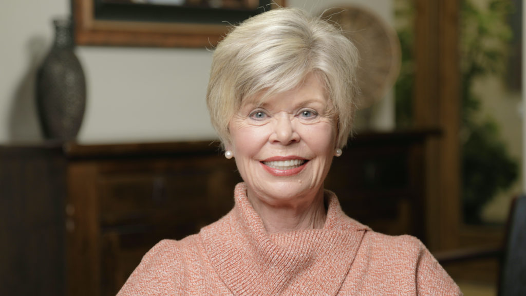 Smilling patient Kathy giving a testimonial