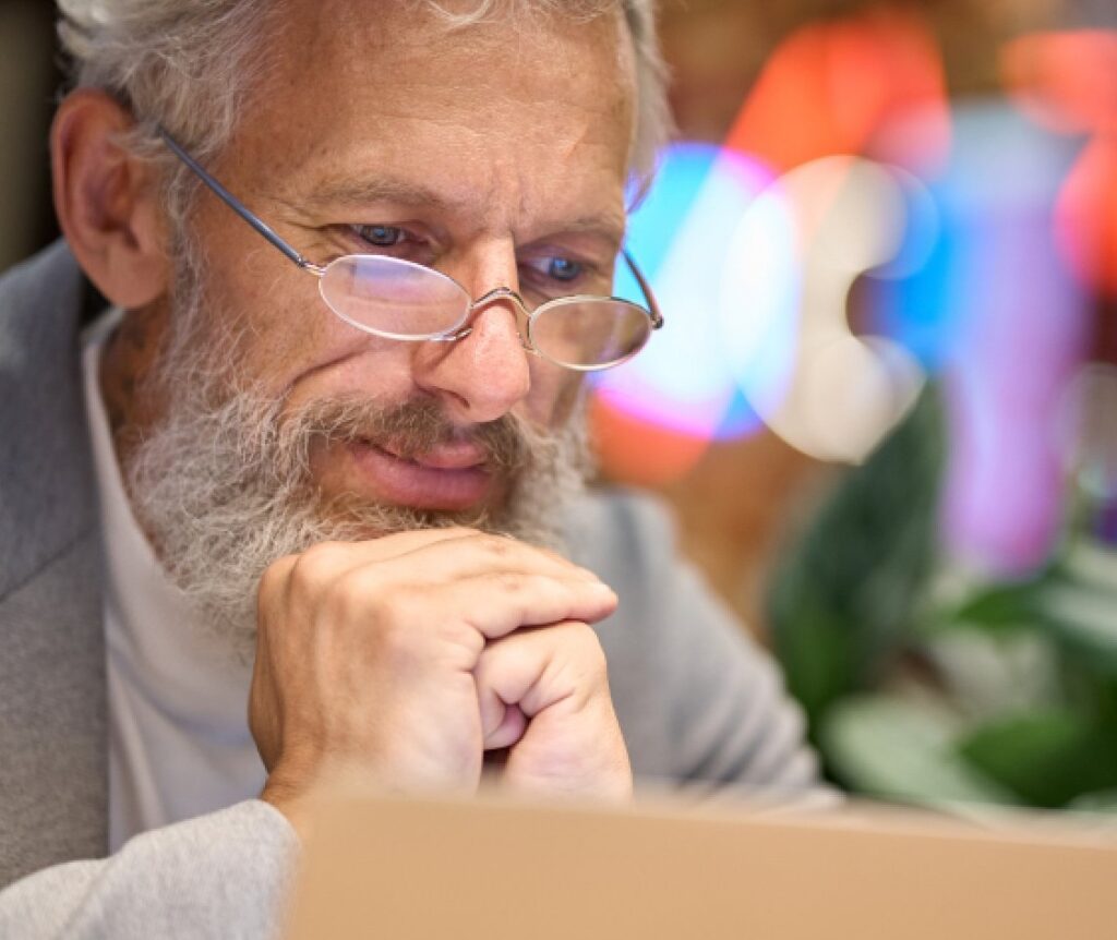 Man with glasses pictured closely